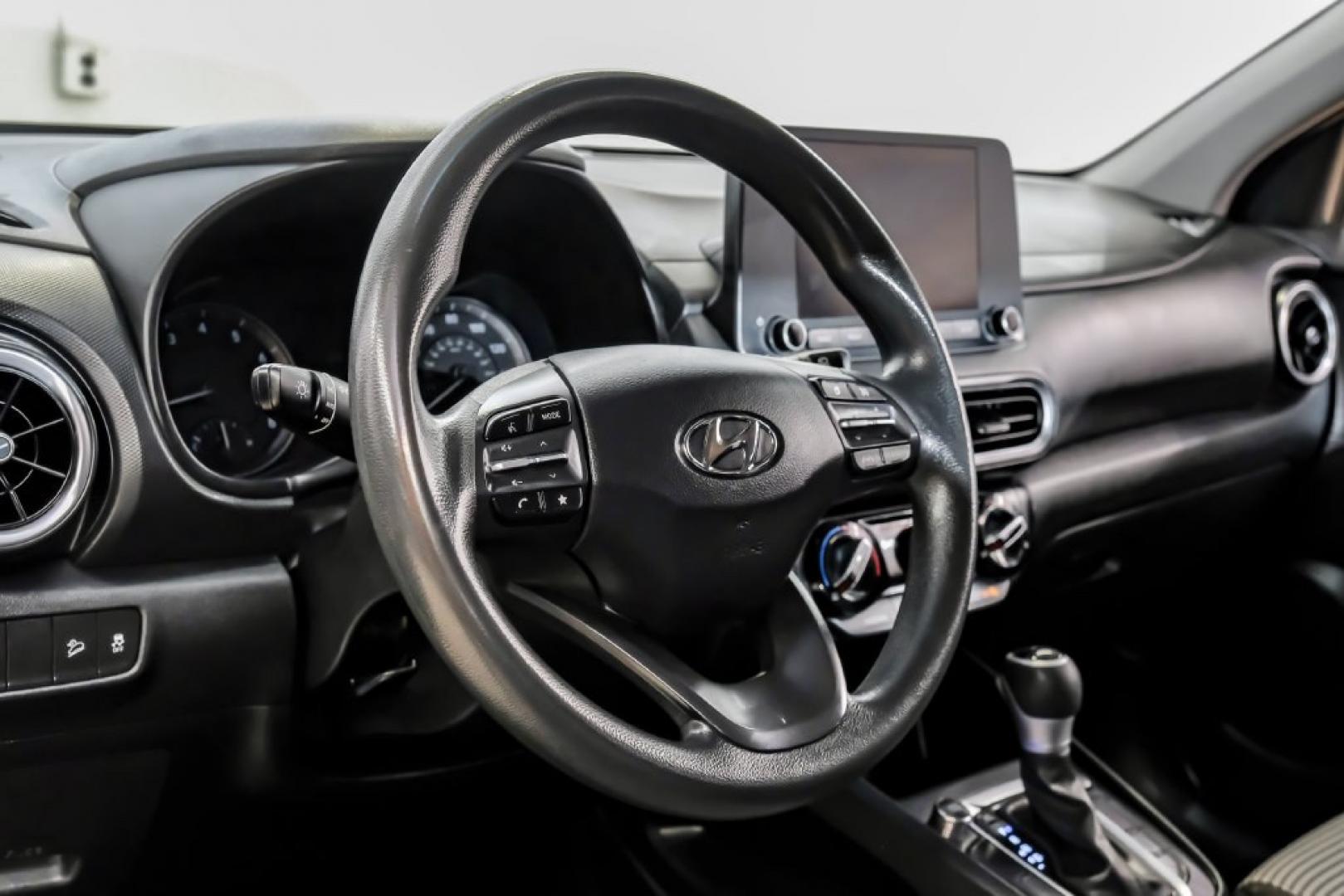 2023 Silver /Black Hyundai Kona SE (KM8K22AB4PU) with an 2.0L I4 DOHC Dual CVVT engine, CVT transmission, located at 15300 Midway Rd., Addison, TX, 75001, (972) 702-0011, 32.958321, -96.838074- Photo#20