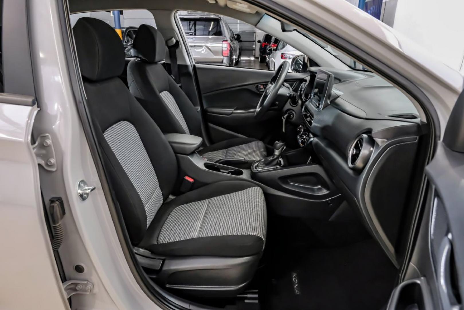 2023 Silver /Black Hyundai Kona SE (KM8K22AB4PU) with an 2.0L I4 DOHC Dual CVVT engine, CVT transmission, located at 15300 Midway Rd., Addison, TX, 75001, (972) 702-0011, 32.958321, -96.838074- Photo#38