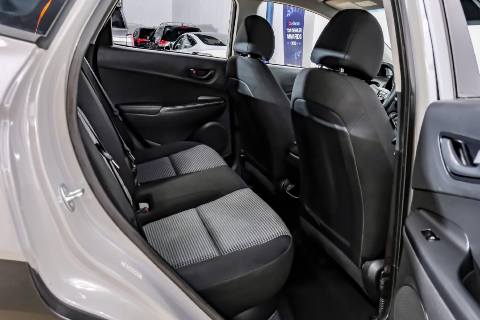 2023 Silver /Black Hyundai Kona SE (KM8K22AB4PU) with an 2.0L I4 DOHC Dual CVVT engine, CVT transmission, located at 15300 Midway Rd., Addison, TX, 75001, (972) 702-0011, 32.958321, -96.838074- Photo#41