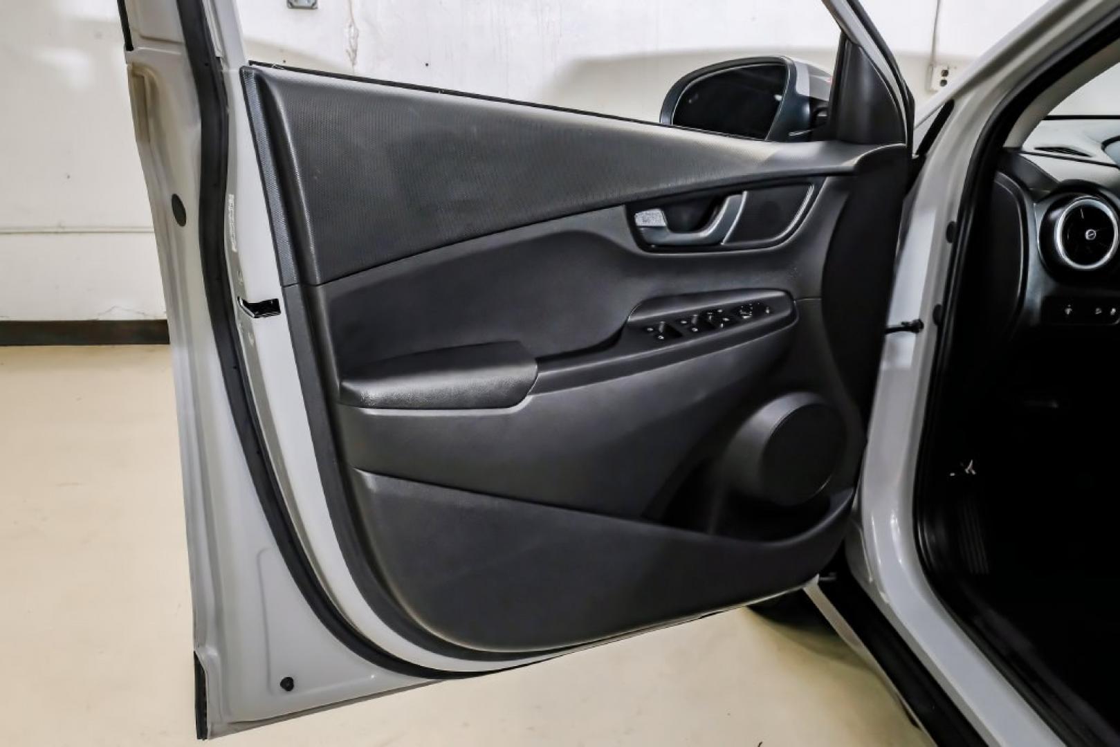 2023 Silver /Black Hyundai Kona SE (KM8K22AB4PU) with an 2.0L I4 DOHC Dual CVVT engine, CVT transmission, located at 15300 Midway Rd., Addison, TX, 75001, (972) 702-0011, 32.958321, -96.838074- Photo#46
