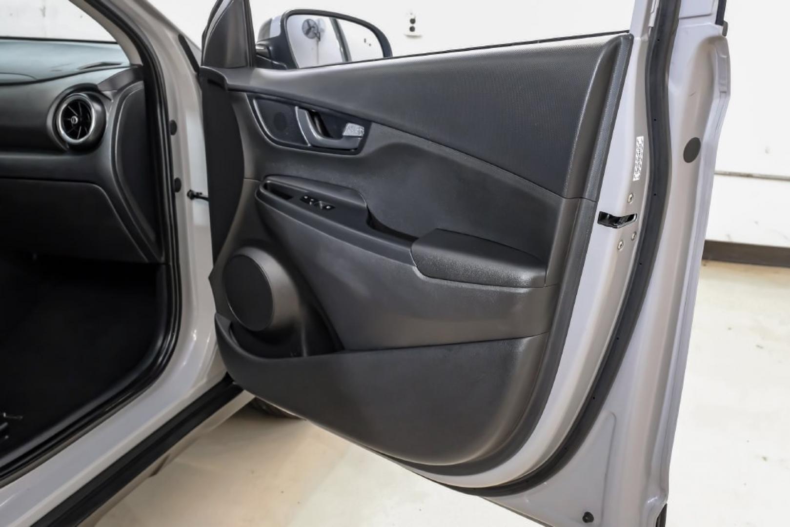 2023 Silver /Black Hyundai Kona SE (KM8K22AB4PU) with an 2.0L I4 DOHC Dual CVVT engine, CVT transmission, located at 15300 Midway Rd., Addison, TX, 75001, (972) 702-0011, 32.958321, -96.838074- Photo#48