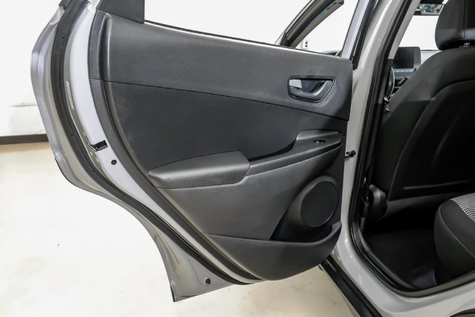 2023 Silver /Black Hyundai Kona SE (KM8K22AB4PU) with an 2.0L I4 DOHC Dual CVVT engine, CVT transmission, located at 15300 Midway Rd., Addison, TX, 75001, (972) 702-0011, 32.958321, -96.838074- Photo#49