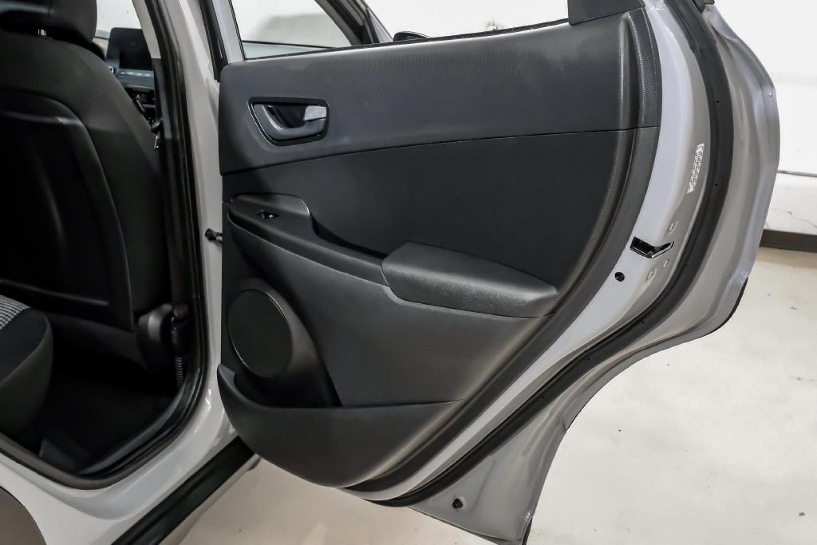 2023 Silver /Black Hyundai Kona SE (KM8K22AB4PU) with an 2.0L I4 DOHC Dual CVVT engine, CVT transmission, located at 15300 Midway Rd., Addison, TX, 75001, (972) 702-0011, 32.958321, -96.838074- Photo#50