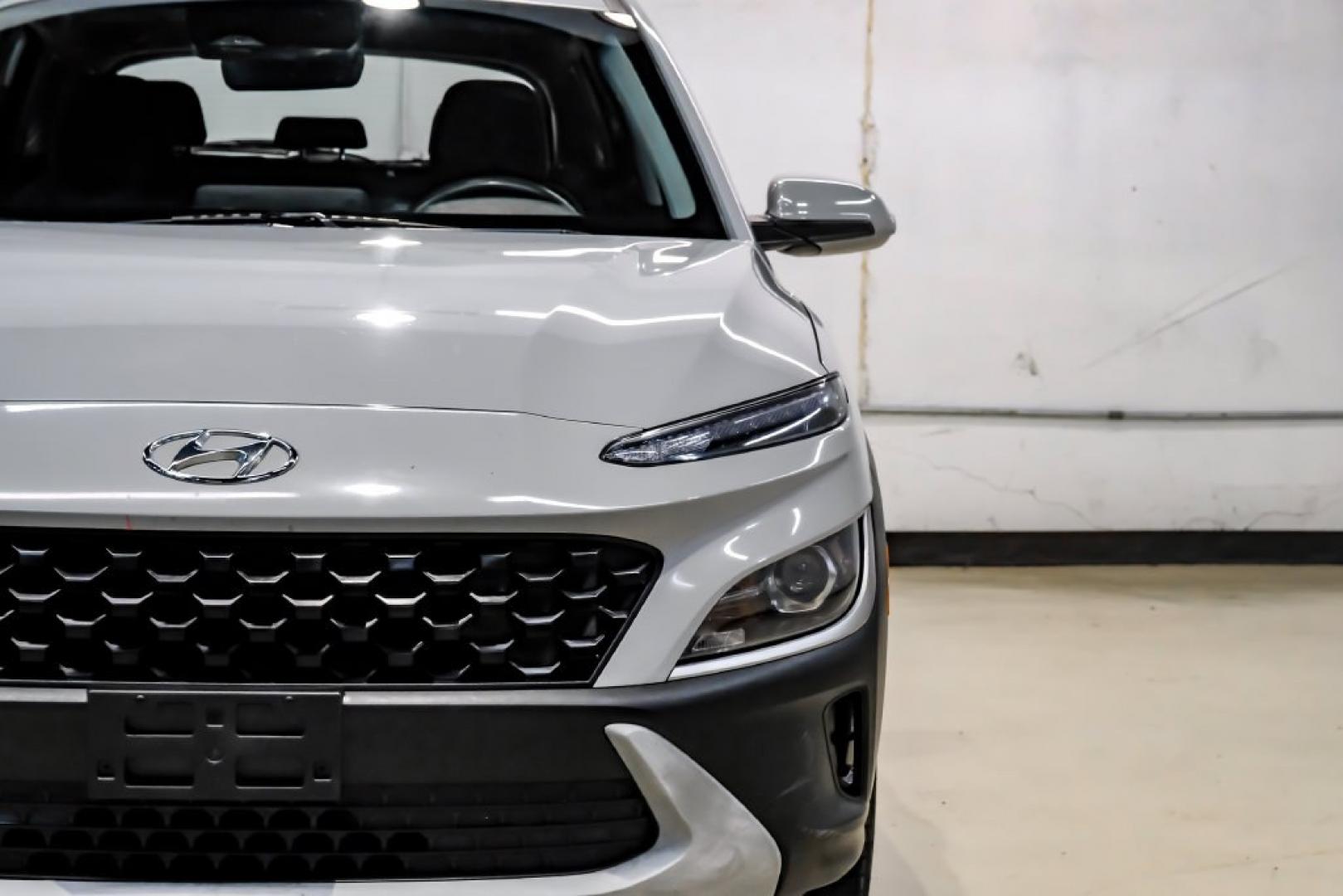 2023 Silver /Black Hyundai Kona SE (KM8K22AB4PU) with an 2.0L I4 DOHC Dual CVVT engine, CVT transmission, located at 15300 Midway Rd., Addison, TX, 75001, (972) 702-0011, 32.958321, -96.838074- Photo#51