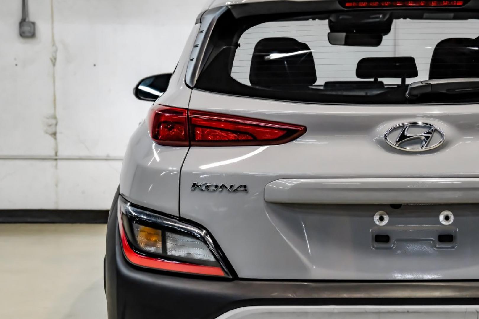 2023 Silver /Black Hyundai Kona SE (KM8K22AB4PU) with an 2.0L I4 DOHC Dual CVVT engine, CVT transmission, located at 15300 Midway Rd., Addison, TX, 75001, (972) 702-0011, 32.958321, -96.838074- Photo#52