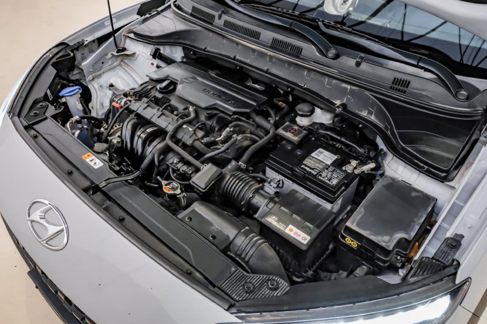 2023 Silver /Black Hyundai Kona SE (KM8K22AB4PU) with an 2.0L I4 DOHC Dual CVVT engine, CVT transmission, located at 15300 Midway Rd., Addison, TX, 75001, (972) 702-0011, 32.958321, -96.838074- Photo#54