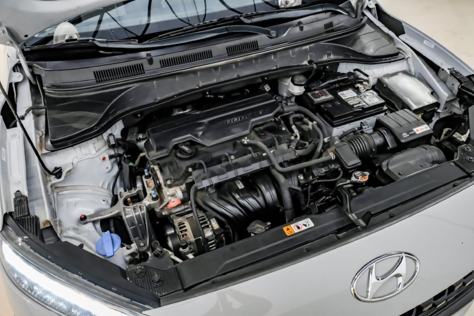 2023 Silver /Black Hyundai Kona SE (KM8K22AB4PU) with an 2.0L I4 DOHC Dual CVVT engine, CVT transmission, located at 15300 Midway Rd., Addison, TX, 75001, (972) 702-0011, 32.958321, -96.838074- Photo#56