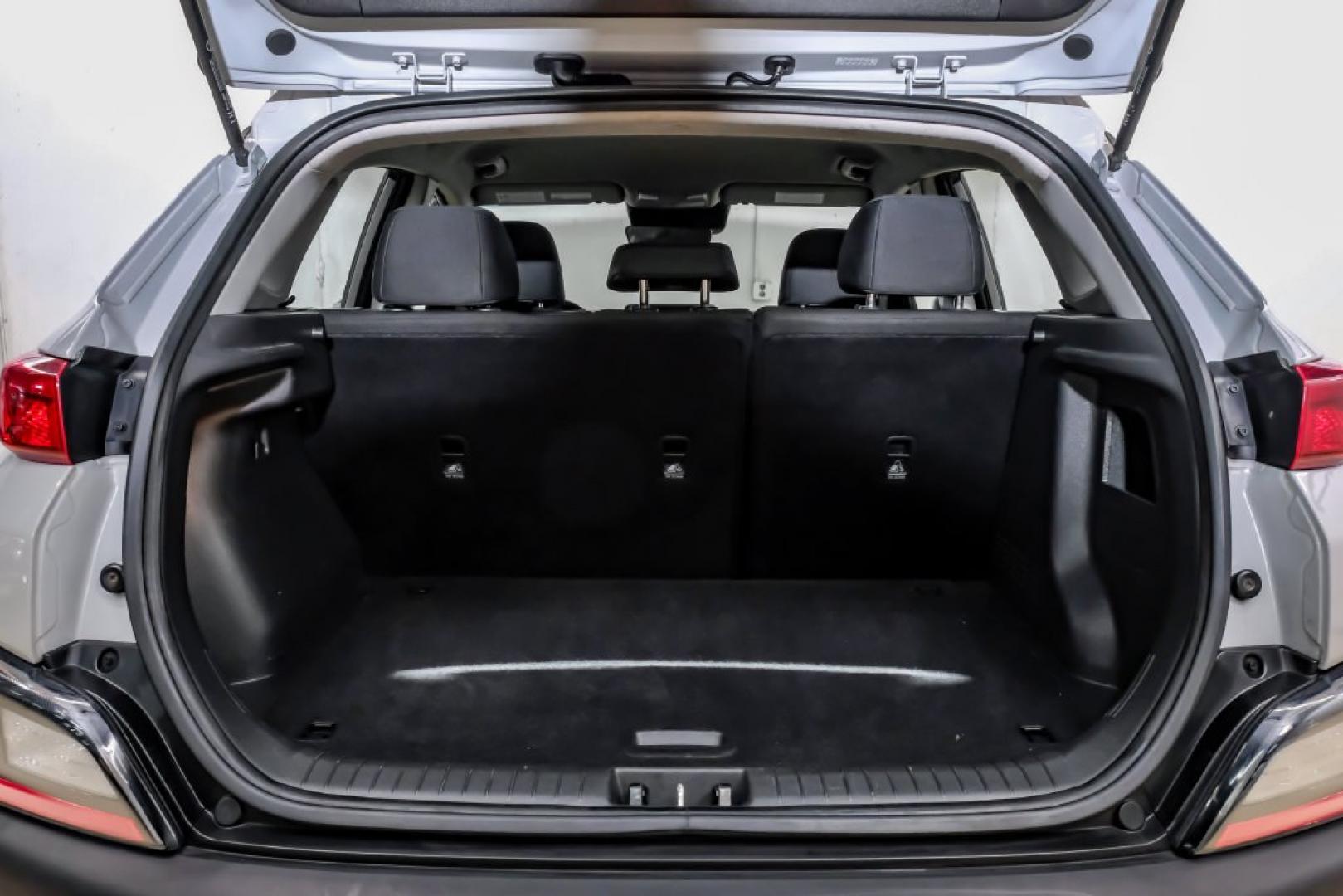 2023 Silver /Black Hyundai Kona SE (KM8K22AB4PU) with an 2.0L I4 DOHC Dual CVVT engine, CVT transmission, located at 15300 Midway Rd., Addison, TX, 75001, (972) 702-0011, 32.958321, -96.838074- Photo#58