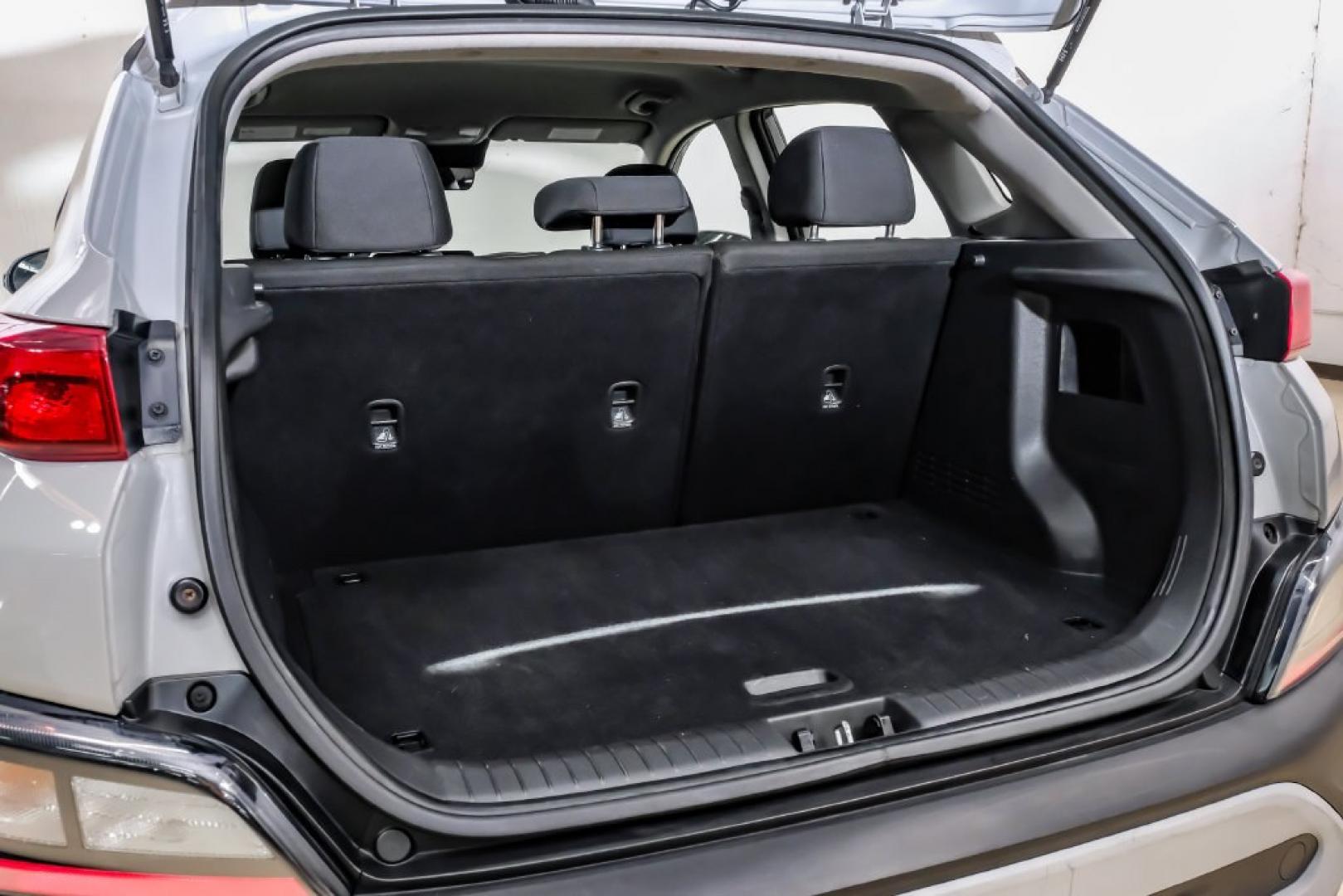 2023 Silver /Black Hyundai Kona SE (KM8K22AB4PU) with an 2.0L I4 DOHC Dual CVVT engine, CVT transmission, located at 15300 Midway Rd., Addison, TX, 75001, (972) 702-0011, 32.958321, -96.838074- Photo#59