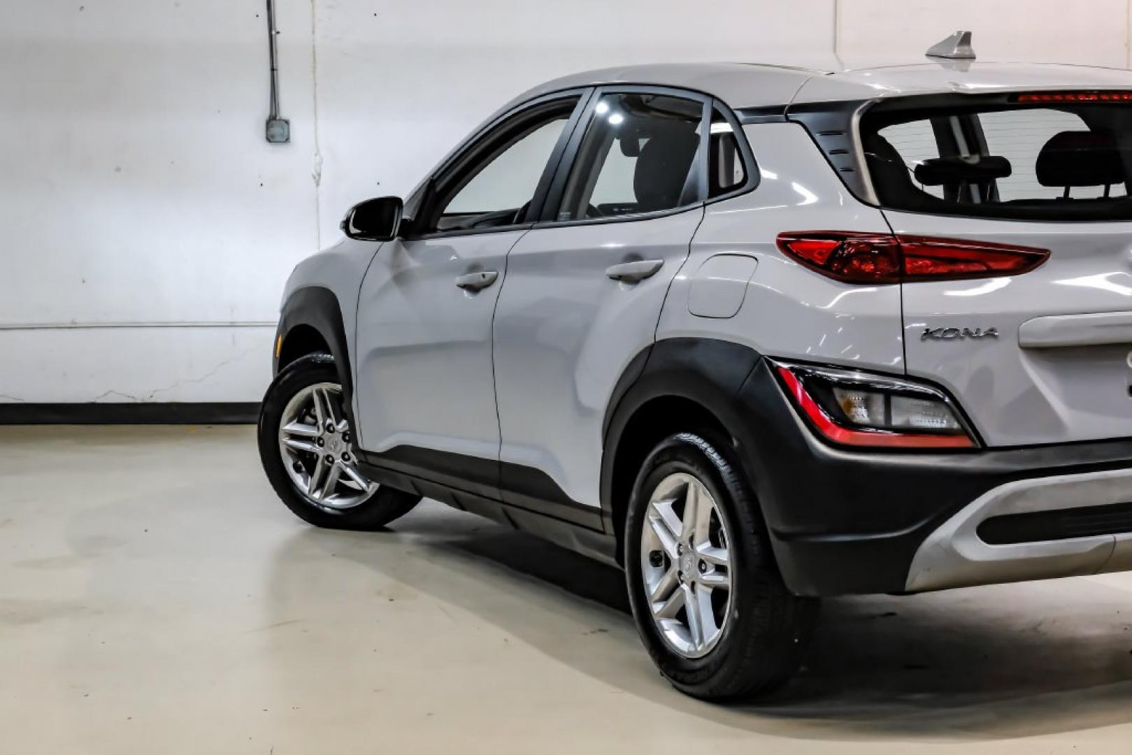 2023 Silver /Black Hyundai Kona SE (KM8K22ABXPU) with an 2.0L I4 DOHC Dual CVVT engine, CVT transmission, located at 15300 Midway Rd., Addison, TX, 75001, (972) 702-0011, 32.958321, -96.838074- Photo#12