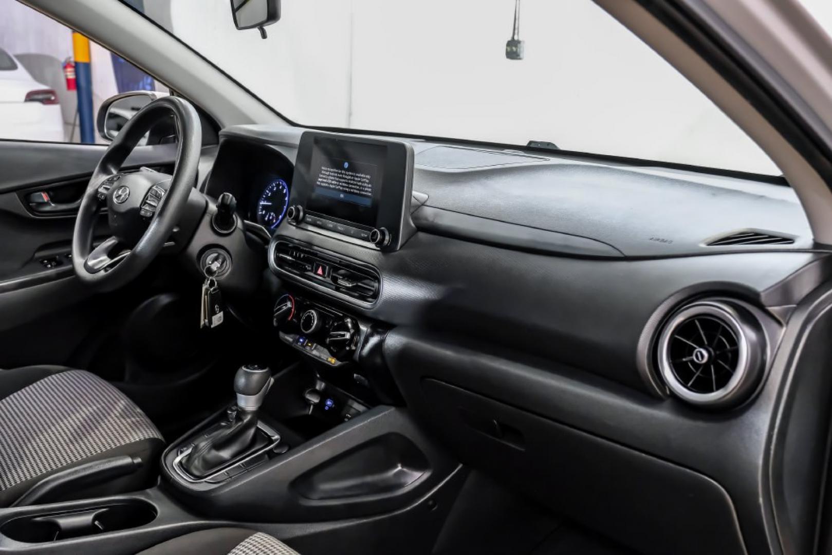 2023 Silver /Black Hyundai Kona SE (KM8K22ABXPU) with an 2.0L I4 DOHC Dual CVVT engine, CVT transmission, located at 15300 Midway Rd., Addison, TX, 75001, (972) 702-0011, 32.958321, -96.838074- Photo#17