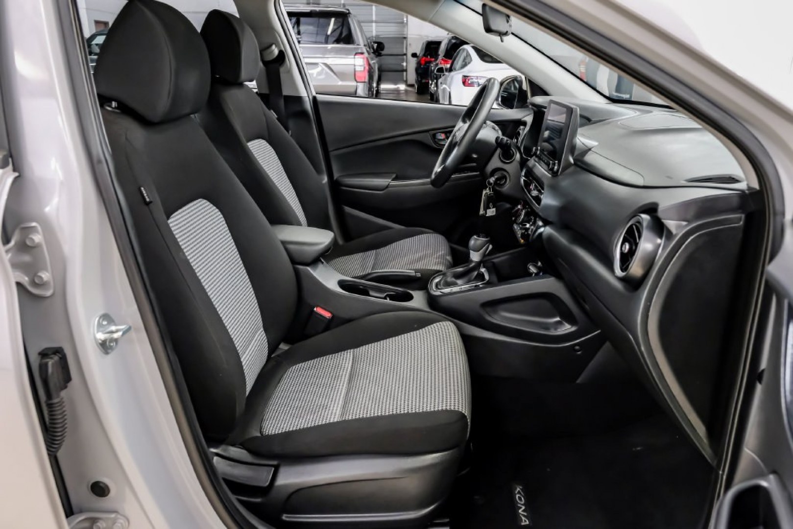 2023 Silver /Black Hyundai Kona SE (KM8K22ABXPU) with an 2.0L I4 DOHC Dual CVVT engine, CVT transmission, located at 15300 Midway Rd., Addison, TX, 75001, (972) 702-0011, 32.958321, -96.838074- Photo#38