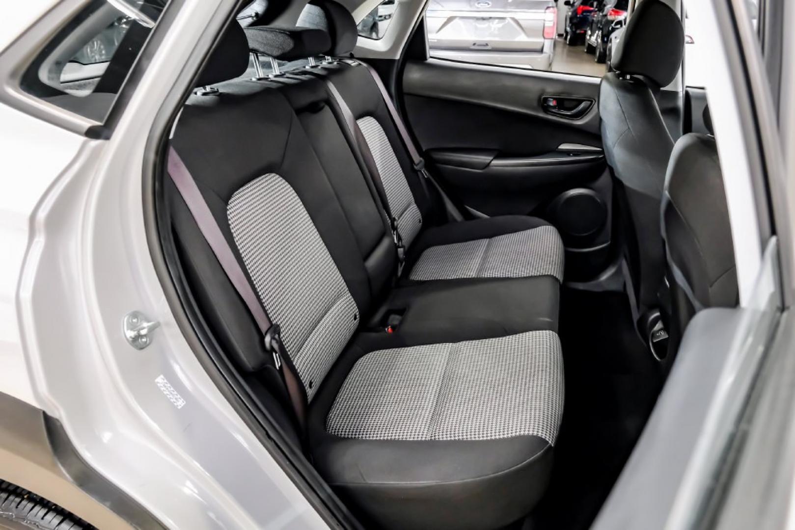 2023 Silver /Black Hyundai Kona SE (KM8K22ABXPU) with an 2.0L I4 DOHC Dual CVVT engine, CVT transmission, located at 15300 Midway Rd., Addison, TX, 75001, (972) 702-0011, 32.958321, -96.838074- Photo#40