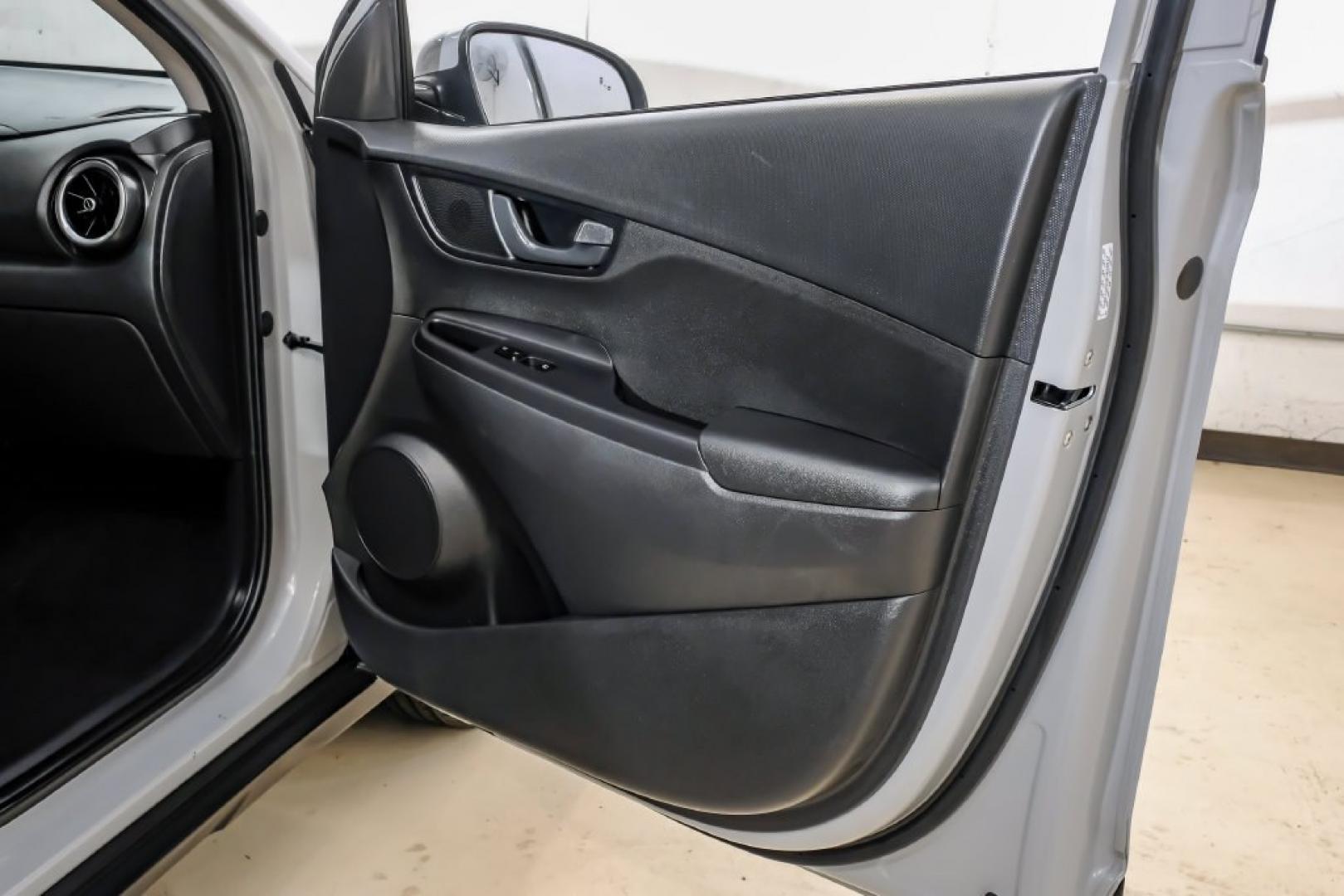 2023 Silver /Black Hyundai Kona SE (KM8K22ABXPU) with an 2.0L I4 DOHC Dual CVVT engine, CVT transmission, located at 15300 Midway Rd., Addison, TX, 75001, (972) 702-0011, 32.958321, -96.838074- Photo#48