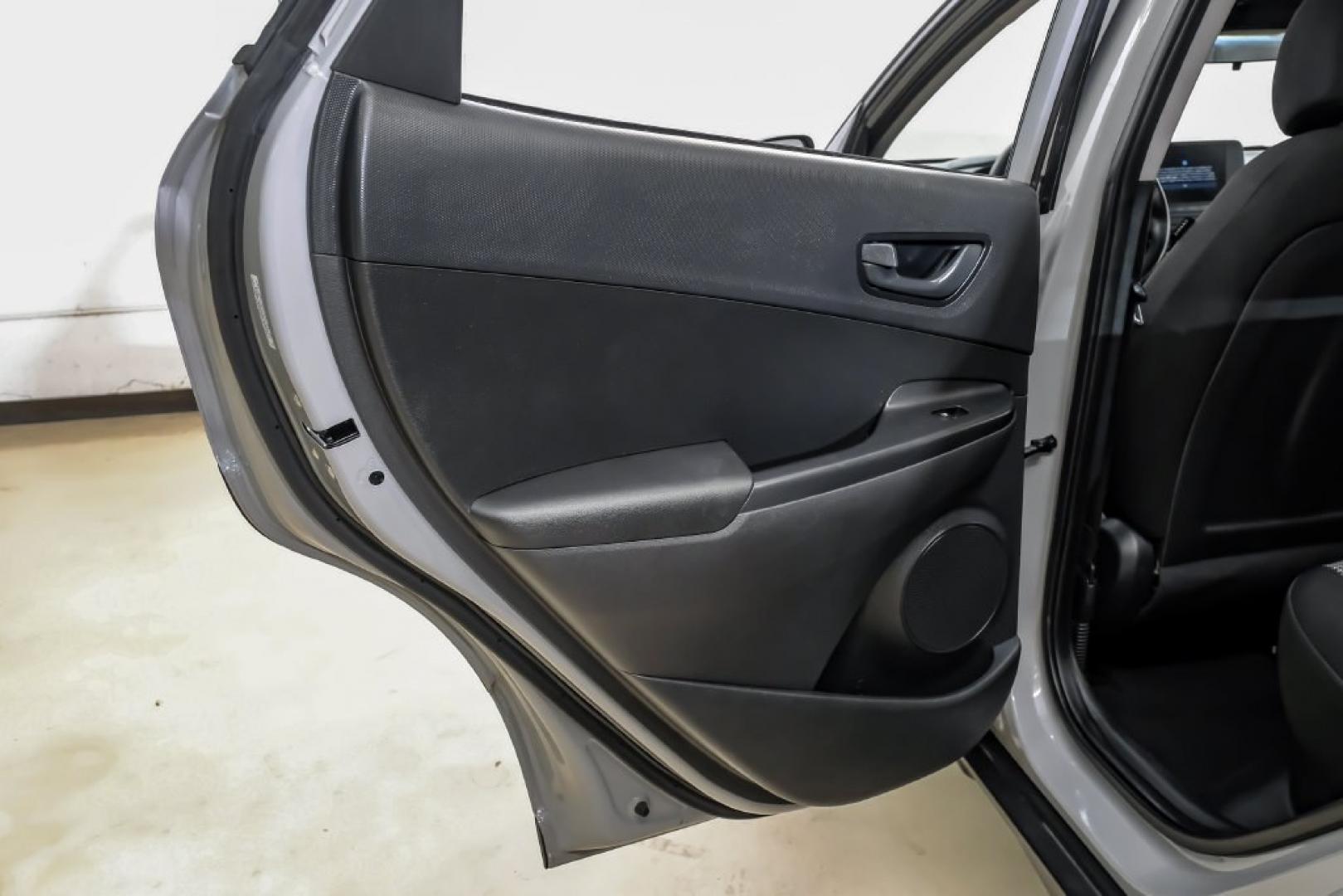 2023 Silver /Black Hyundai Kona SE (KM8K22ABXPU) with an 2.0L I4 DOHC Dual CVVT engine, CVT transmission, located at 15300 Midway Rd., Addison, TX, 75001, (972) 702-0011, 32.958321, -96.838074- Photo#49