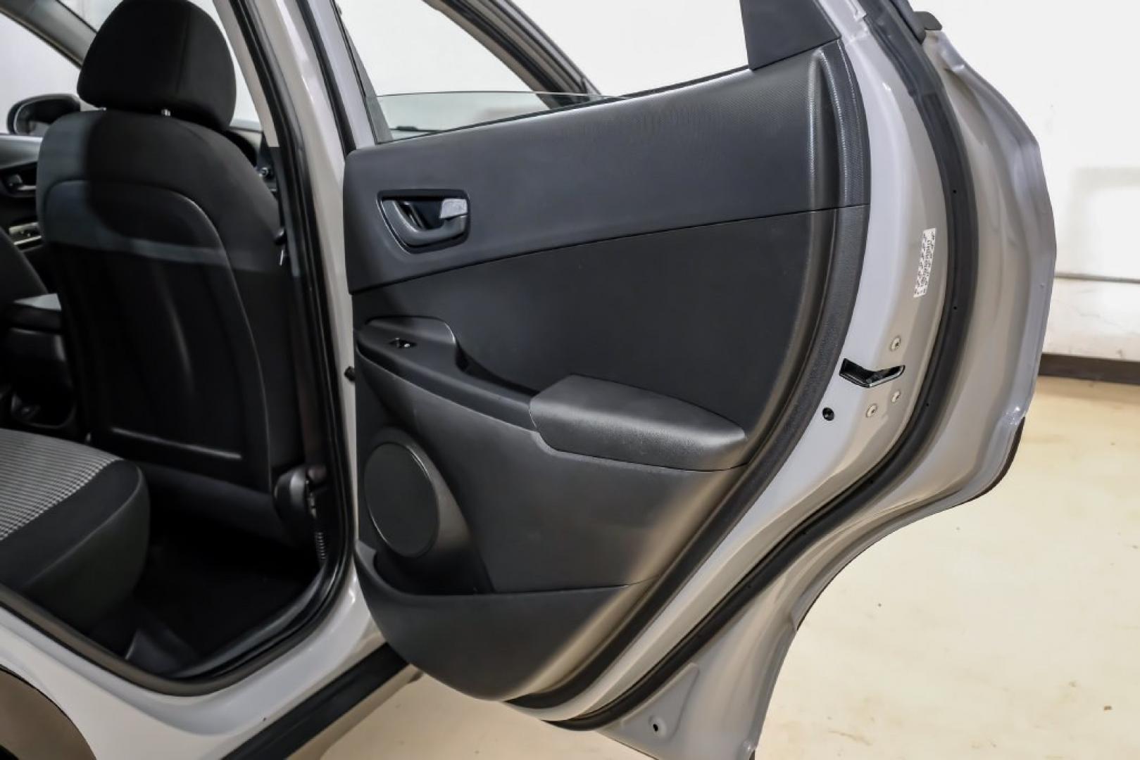 2023 Silver /Black Hyundai Kona SE (KM8K22ABXPU) with an 2.0L I4 DOHC Dual CVVT engine, CVT transmission, located at 15300 Midway Rd., Addison, TX, 75001, (972) 702-0011, 32.958321, -96.838074- Photo#50