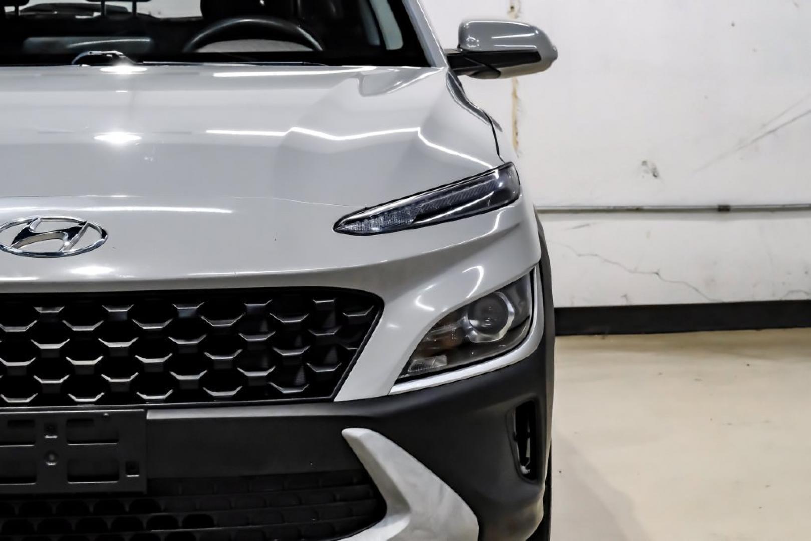 2023 Silver /Black Hyundai Kona SE (KM8K22ABXPU) with an 2.0L I4 DOHC Dual CVVT engine, CVT transmission, located at 15300 Midway Rd., Addison, TX, 75001, (972) 702-0011, 32.958321, -96.838074- Photo#51