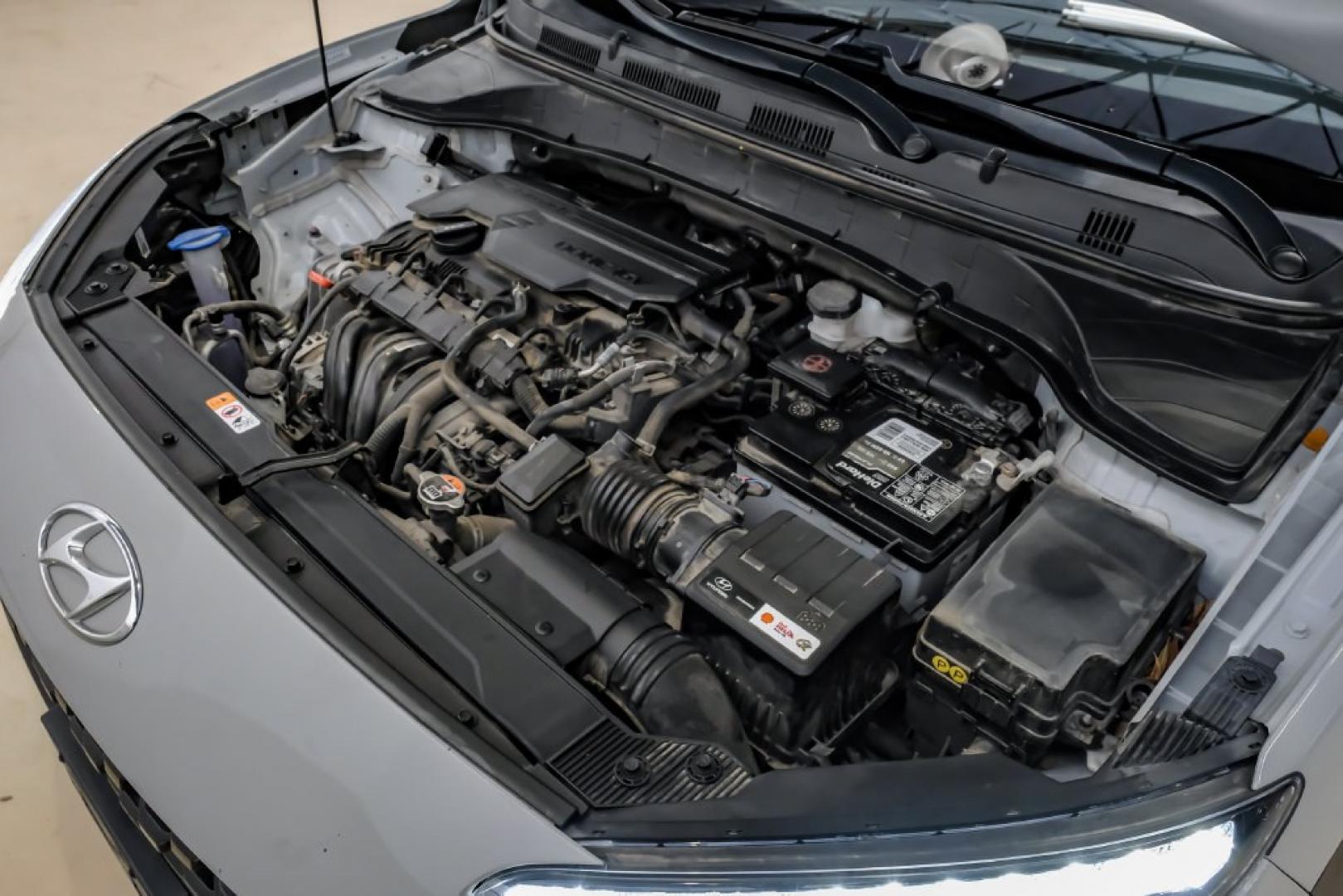 2023 Silver /Black Hyundai Kona SE (KM8K22ABXPU) with an 2.0L I4 DOHC Dual CVVT engine, CVT transmission, located at 15300 Midway Rd., Addison, TX, 75001, (972) 702-0011, 32.958321, -96.838074- Photo#54
