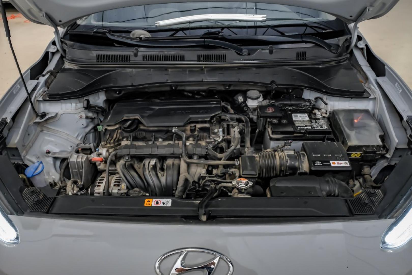 2023 Silver /Black Hyundai Kona SE (KM8K22ABXPU) with an 2.0L I4 DOHC Dual CVVT engine, CVT transmission, located at 15300 Midway Rd., Addison, TX, 75001, (972) 702-0011, 32.958321, -96.838074- Photo#55