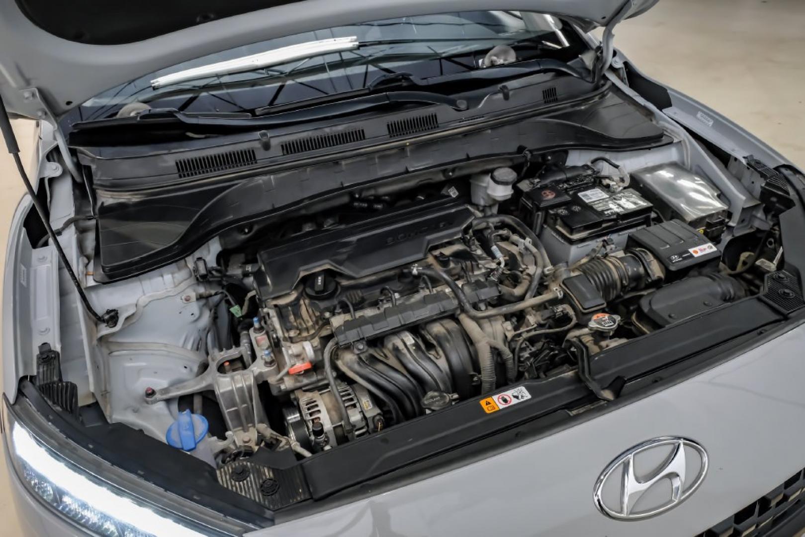 2023 Silver /Black Hyundai Kona SE (KM8K22ABXPU) with an 2.0L I4 DOHC Dual CVVT engine, CVT transmission, located at 15300 Midway Rd., Addison, TX, 75001, (972) 702-0011, 32.958321, -96.838074- Photo#56