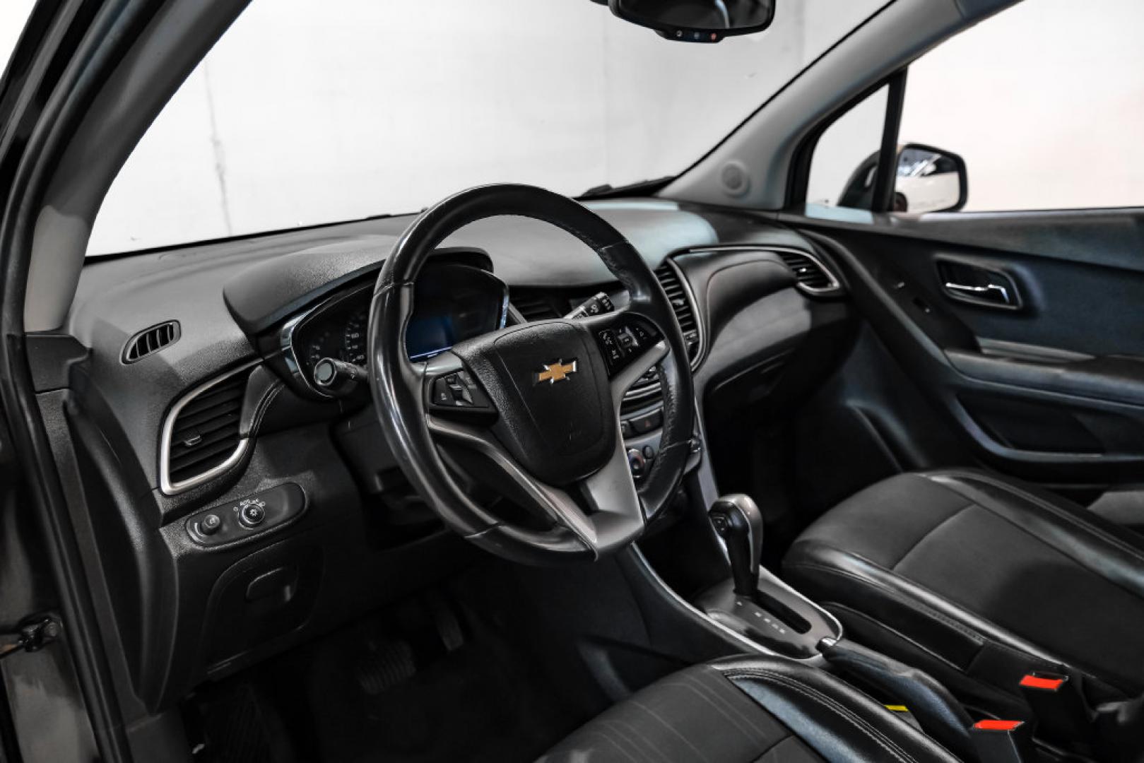 2019 Black Metallic /Jet Black Chevrolet Trax LT (3GNCJLSB1KL) with an ECOTEC 1.4L I4 SMPI DOHC Turbocharged VVT engine, Automatic transmission, located at 15300 Midway Rd., Addison, TX, 75001, (972) 702-0011, 32.958321, -96.838074- Photo#2