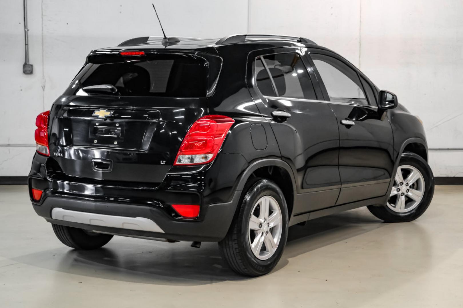 2019 Black Metallic /Jet Black Chevrolet Trax LT (3GNCJLSB1KL) with an ECOTEC 1.4L I4 SMPI DOHC Turbocharged VVT engine, Automatic transmission, located at 15300 Midway Rd., Addison, TX, 75001, (972) 702-0011, 32.958321, -96.838074- Photo#7
