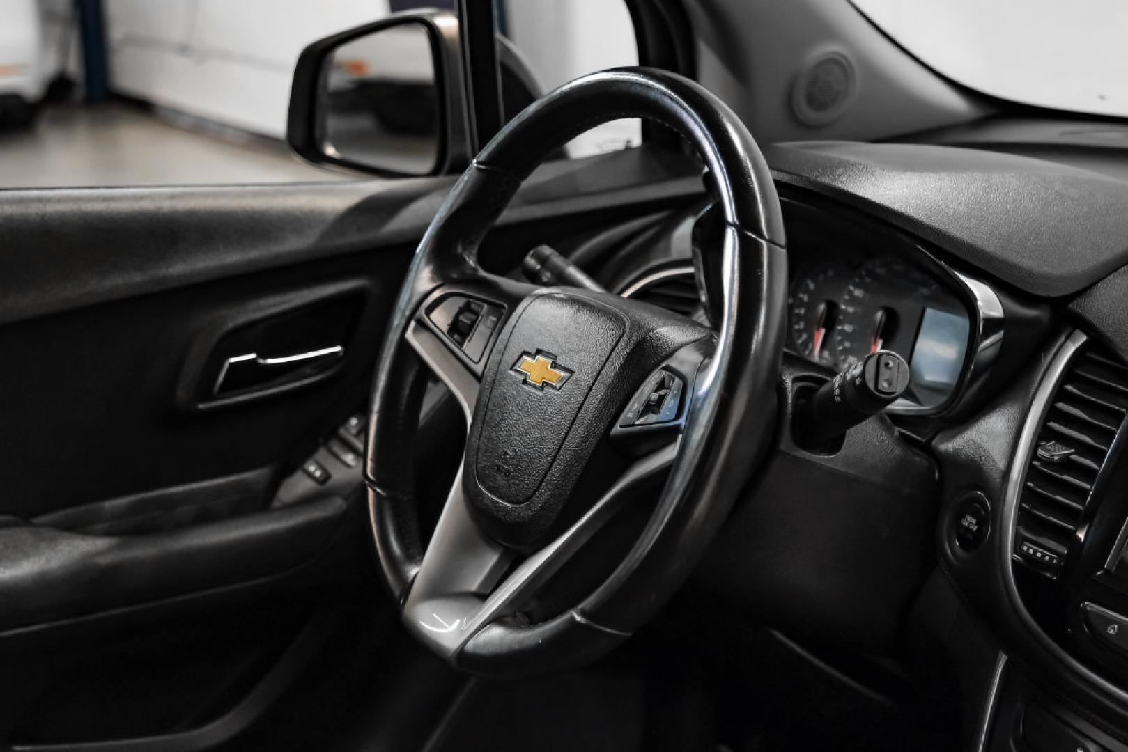 2019 Black Metallic /Jet Black Chevrolet Trax LT (3GNCJLSB1KL) with an ECOTEC 1.4L I4 SMPI DOHC Turbocharged VVT engine, Automatic transmission, located at 15300 Midway Rd., Addison, TX, 75001, (972) 702-0011, 32.958321, -96.838074- Photo#13
