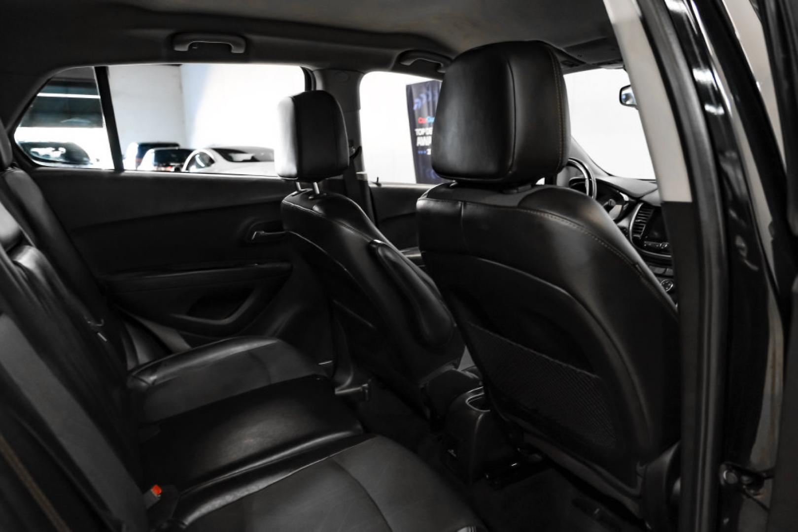 2019 Black Metallic /Jet Black Chevrolet Trax LT (3GNCJLSB1KL) with an ECOTEC 1.4L I4 SMPI DOHC Turbocharged VVT engine, Automatic transmission, located at 15300 Midway Rd., Addison, TX, 75001, (972) 702-0011, 32.958321, -96.838074- Photo#33