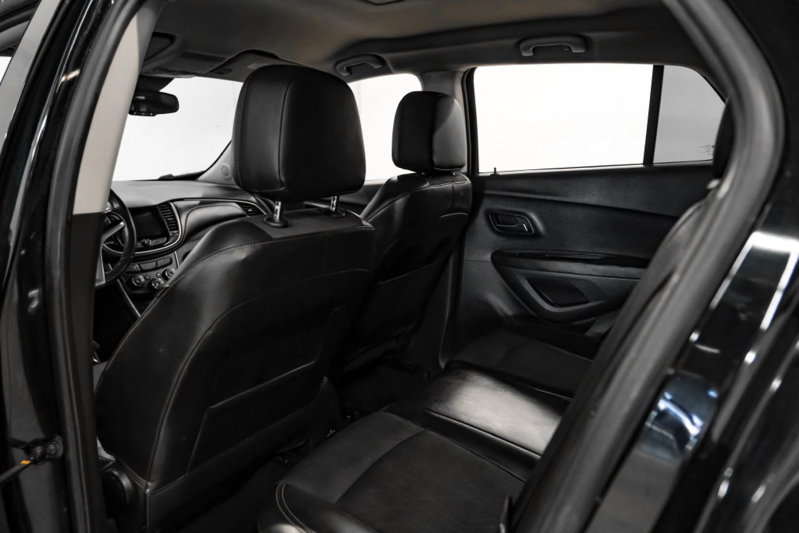 2019 Black Metallic /Jet Black Chevrolet Trax LT (3GNCJLSB1KL) with an ECOTEC 1.4L I4 SMPI DOHC Turbocharged VVT engine, Automatic transmission, located at 15300 Midway Rd., Addison, TX, 75001, (972) 702-0011, 32.958321, -96.838074- Photo#34