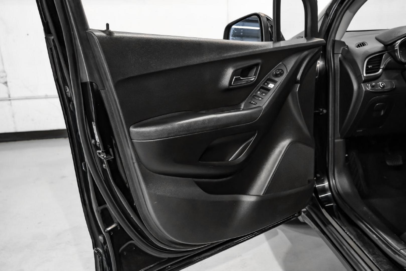 2019 Black Metallic /Jet Black Chevrolet Trax LT (3GNCJLSB1KL) with an ECOTEC 1.4L I4 SMPI DOHC Turbocharged VVT engine, Automatic transmission, located at 15300 Midway Rd., Addison, TX, 75001, (972) 702-0011, 32.958321, -96.838074- Photo#38