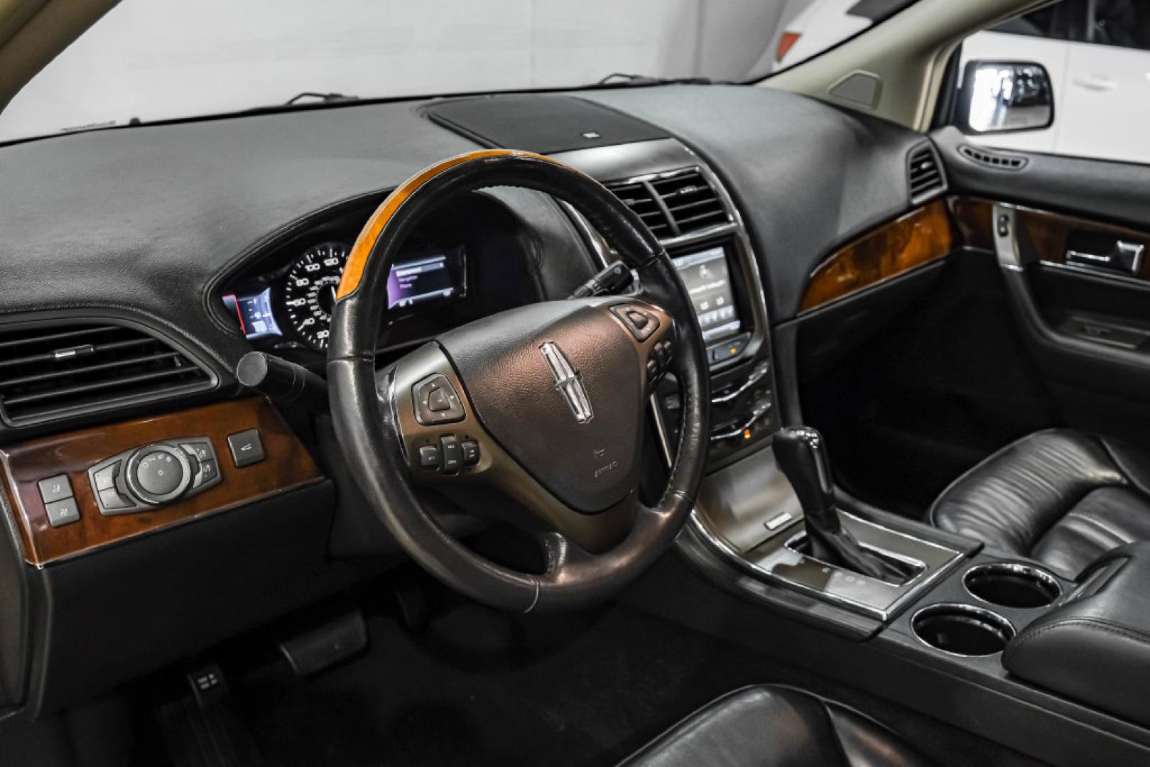 2014 Ingot Silver /Charcoal W/Black Piping Lincoln MKX Base (2LMDJ6JK4EB) with an 3.7L V6 Ti-VCT 24V engine, Automatic transmission, located at 15300 Midway Rd., Addison, TX, 75001, (972) 702-0011, 32.958321, -96.838074- Photo#2