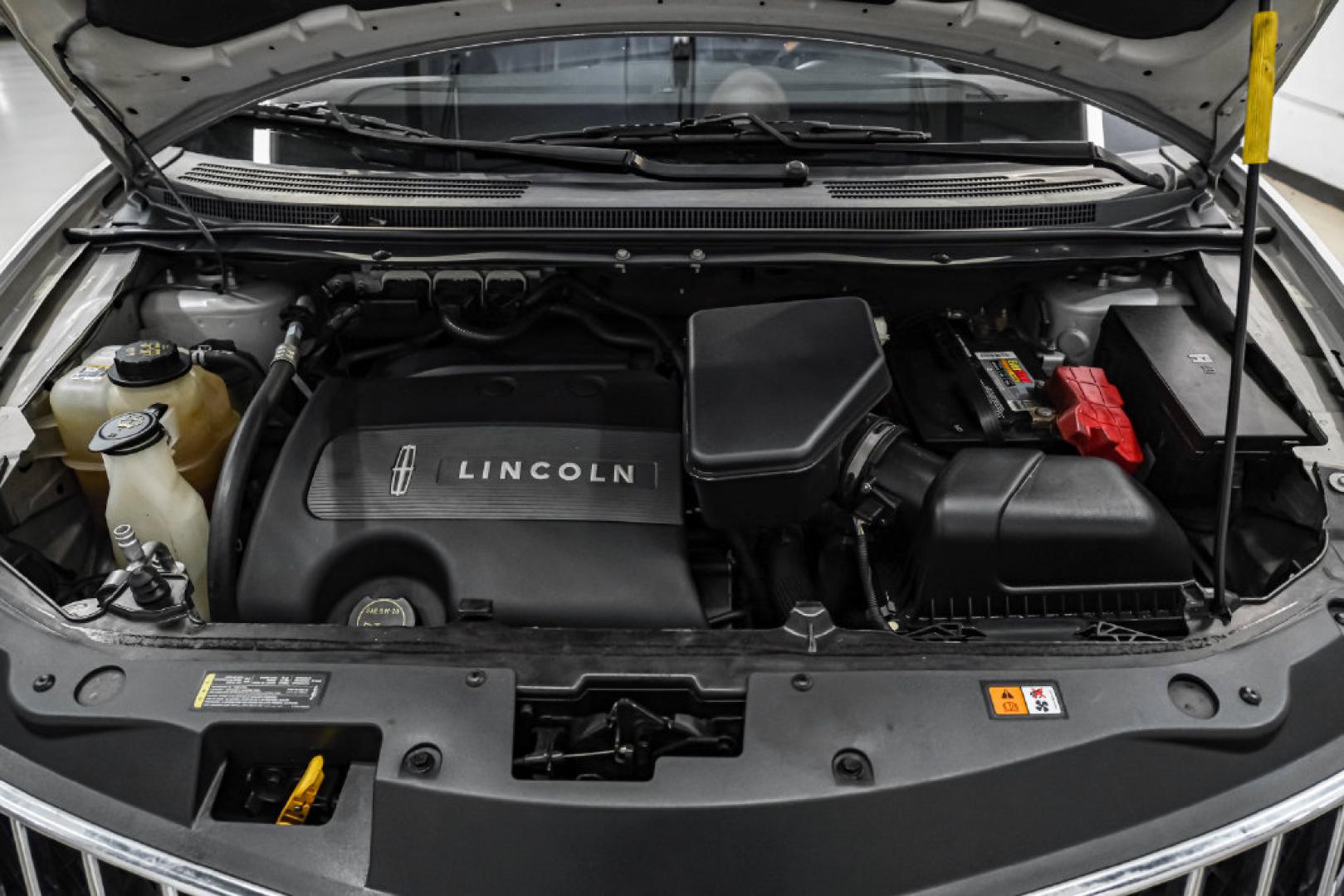 2014 Ingot Silver /Charcoal W/Black Piping Lincoln MKX Base (2LMDJ6JK4EB) with an 3.7L V6 Ti-VCT 24V engine, Automatic transmission, located at 15300 Midway Rd., Addison, TX, 75001, (972) 702-0011, 32.958321, -96.838074- Photo#48