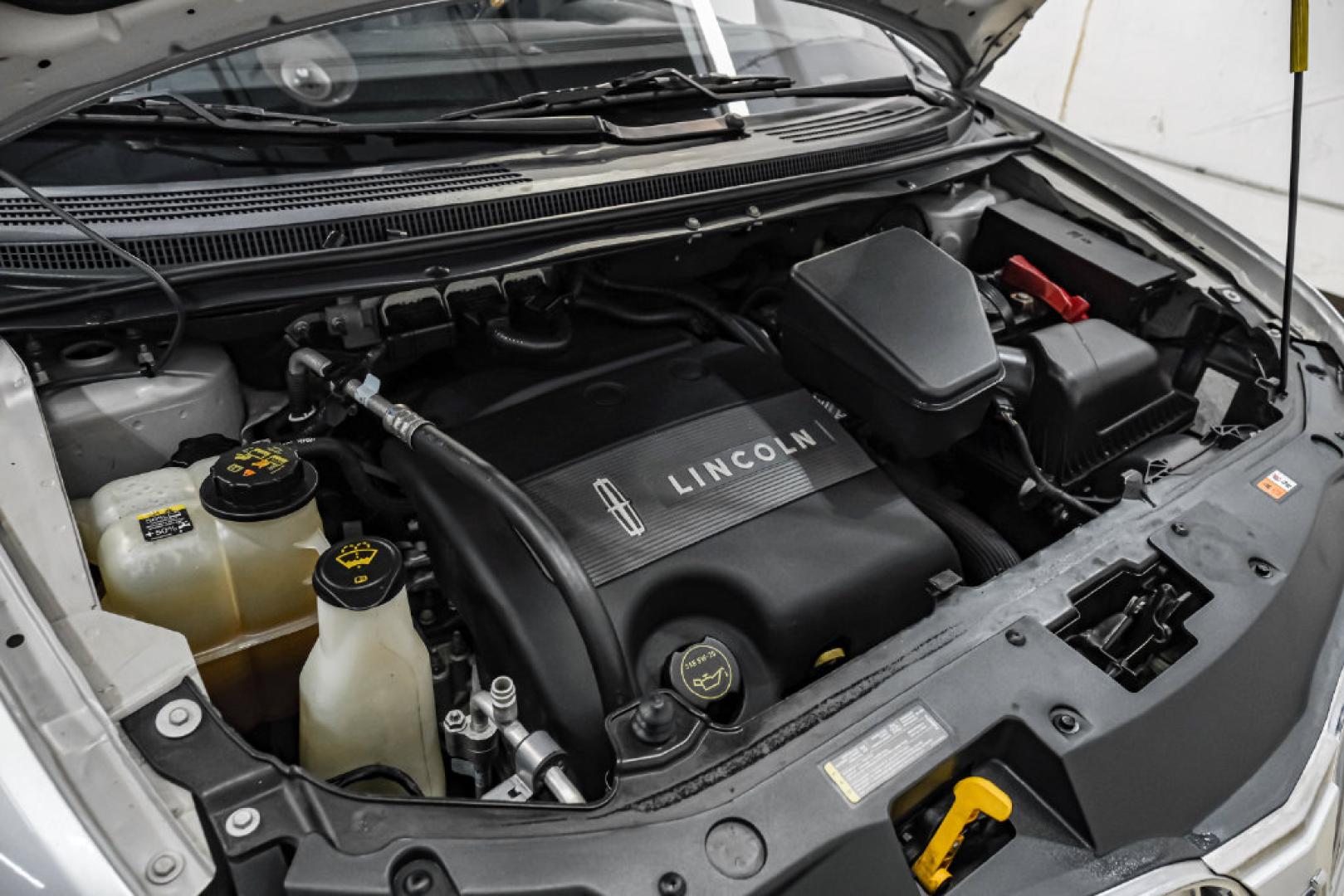 2014 Ingot Silver /Charcoal W/Black Piping Lincoln MKX Base (2LMDJ6JK4EB) with an 3.7L V6 Ti-VCT 24V engine, Automatic transmission, located at 15300 Midway Rd., Addison, TX, 75001, (972) 702-0011, 32.958321, -96.838074- Photo#49
