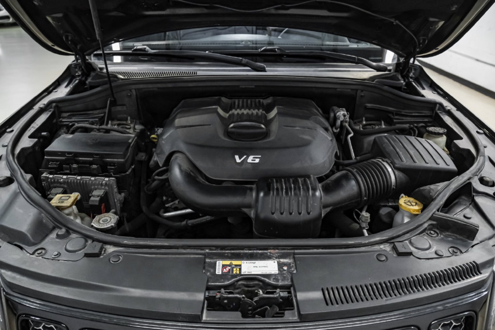 2015 Brilliant Black Crystal Pearlcoat /Black Jeep Grand Cherokee Altitude (1C4RJFAG0FC) with an 3.6L V6 24V VVT engine, Automatic transmission, located at 15300 Midway Rd., Addison, TX, 75001, (972) 702-0011, 32.958321, -96.838074- Photo#46