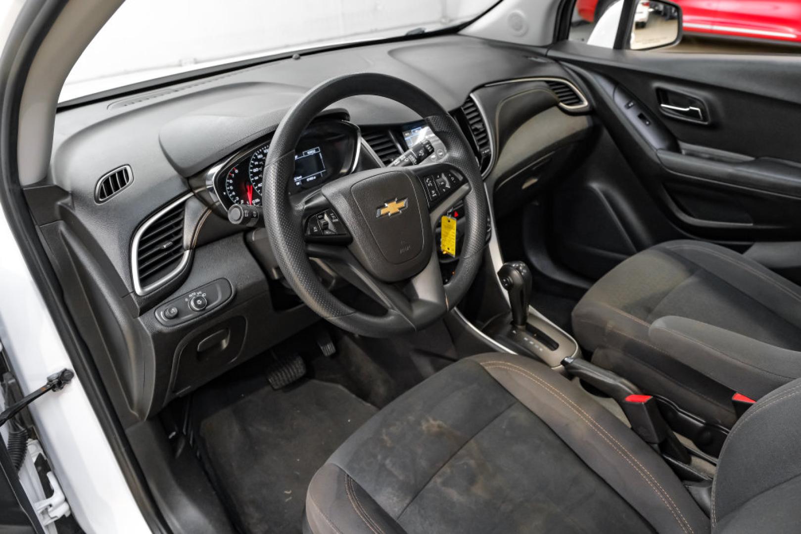 2019 Summit White /Black Chevrolet Trax LS (3GNCJKSB8KL) with an ECOTEC 1.4L I4 SMPI DOHC Turbocharged VVT engine, Automatic transmission, located at 15300 Midway Rd., Addison, TX, 75001, (972) 702-0011, 32.958321, -96.838074- Photo#2