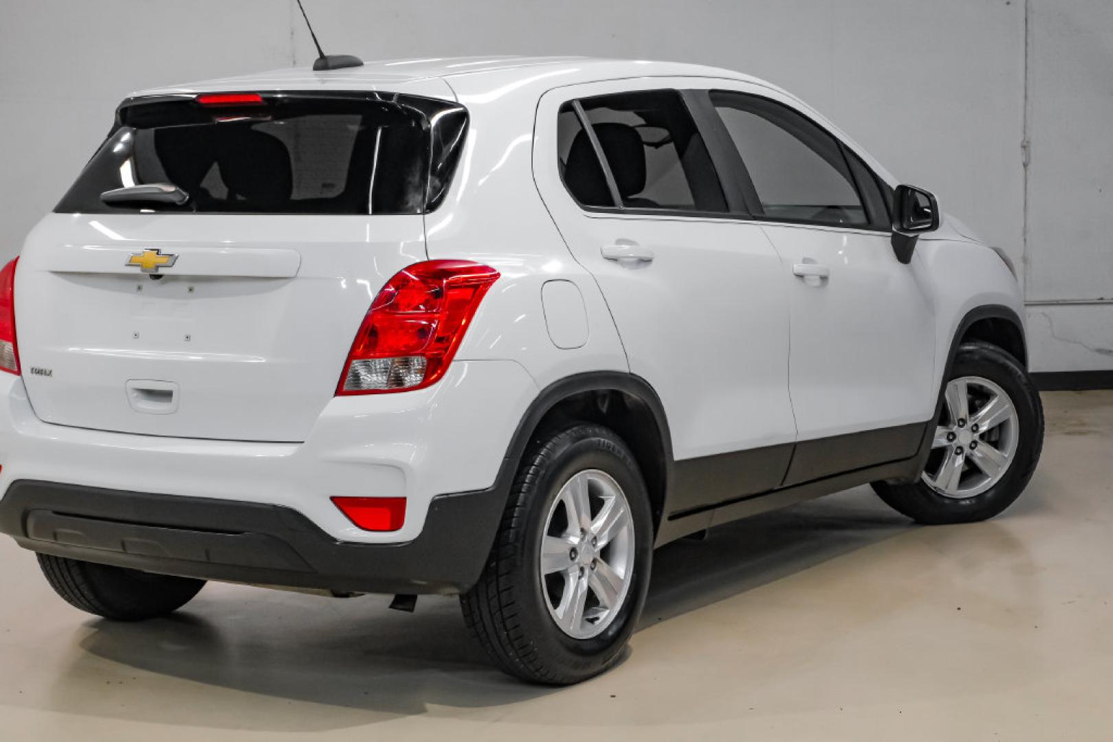 2019 Summit White /Black Chevrolet Trax LS (3GNCJKSB8KL) with an ECOTEC 1.4L I4 SMPI DOHC Turbocharged VVT engine, Automatic transmission, located at 15300 Midway Rd., Addison, TX, 75001, (972) 702-0011, 32.958321, -96.838074- Photo#11