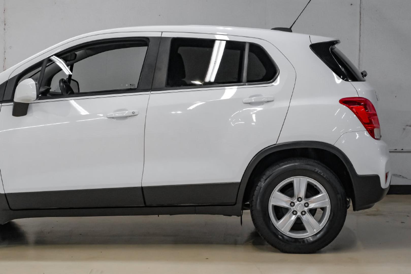 2019 Summit White /Black Chevrolet Trax LS (3GNCJKSB8KL) with an ECOTEC 1.4L I4 SMPI DOHC Turbocharged VVT engine, Automatic transmission, located at 15300 Midway Rd., Addison, TX, 75001, (972) 702-0011, 32.958321, -96.838074- Photo#16