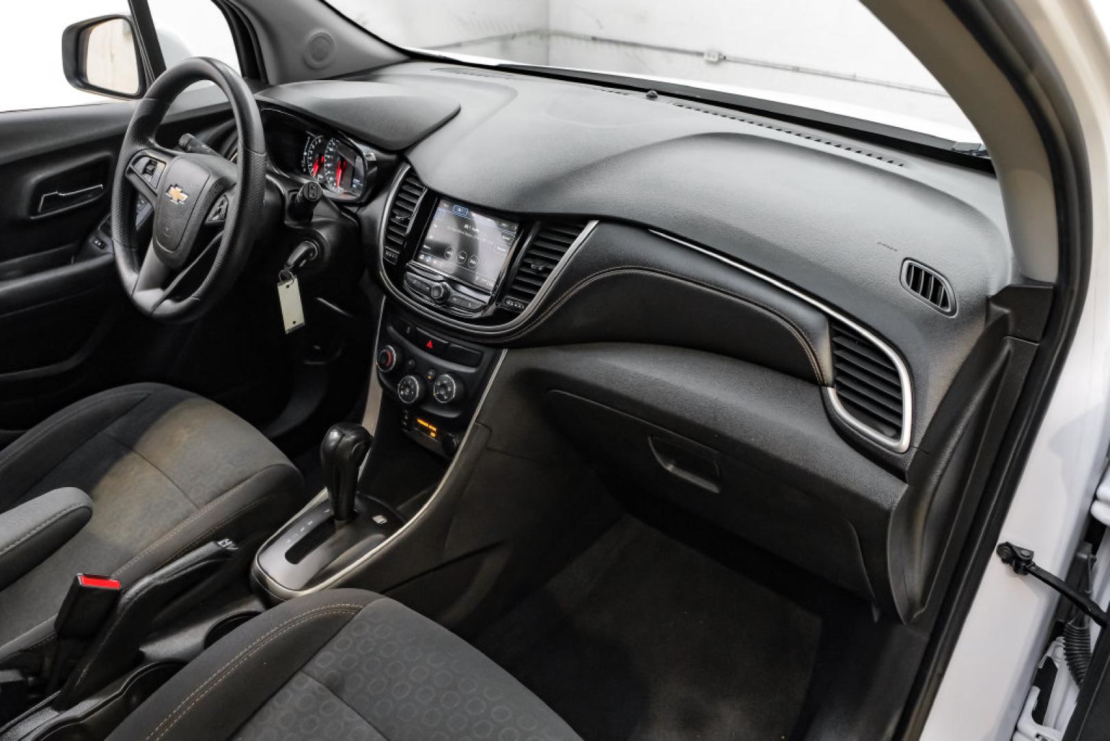 2019 Summit White /Black Chevrolet Trax LS (3GNCJKSB8KL) with an ECOTEC 1.4L I4 SMPI DOHC Turbocharged VVT engine, Automatic transmission, located at 15300 Midway Rd., Addison, TX, 75001, (972) 702-0011, 32.958321, -96.838074- Photo#17