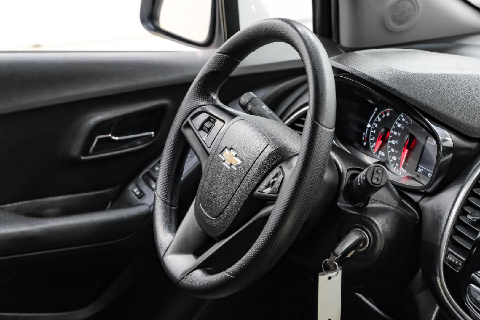 2019 Summit White /Black Chevrolet Trax LS (3GNCJKSB8KL) with an ECOTEC 1.4L I4 SMPI DOHC Turbocharged VVT engine, Automatic transmission, located at 15300 Midway Rd., Addison, TX, 75001, (972) 702-0011, 32.958321, -96.838074- Photo#19