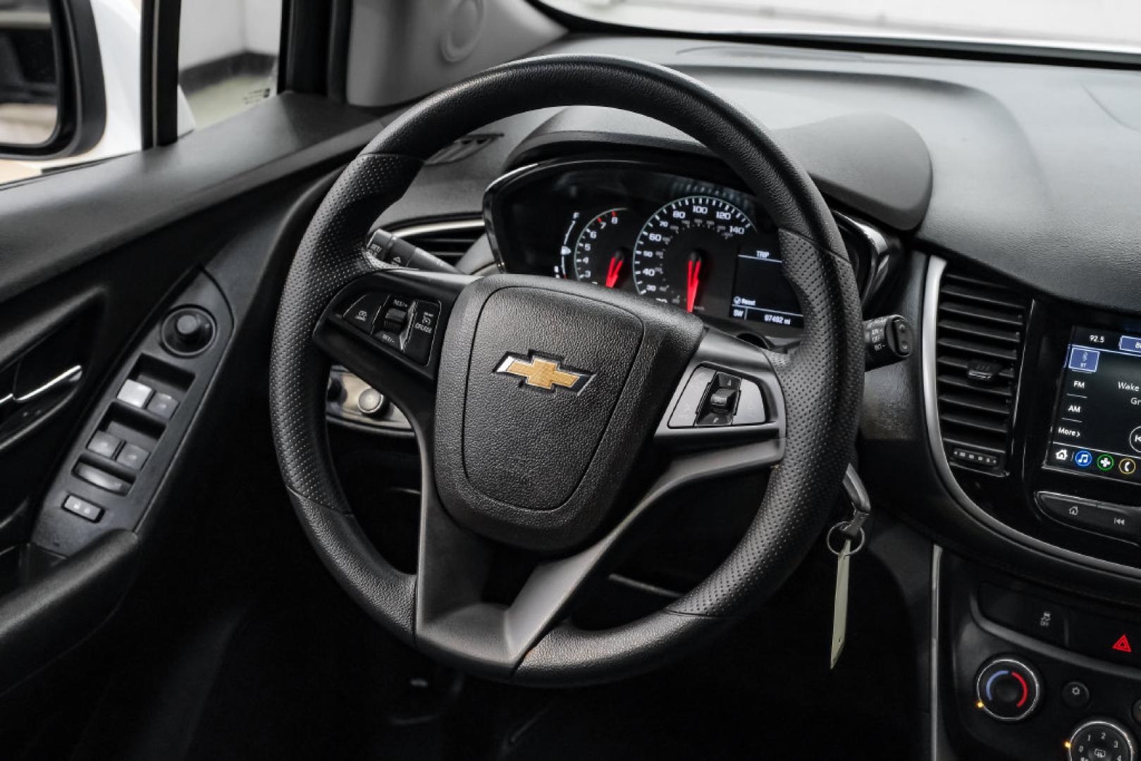 2019 Summit White /Black Chevrolet Trax LS (3GNCJKSB8KL) with an ECOTEC 1.4L I4 SMPI DOHC Turbocharged VVT engine, Automatic transmission, located at 15300 Midway Rd., Addison, TX, 75001, (972) 702-0011, 32.958321, -96.838074- Photo#21