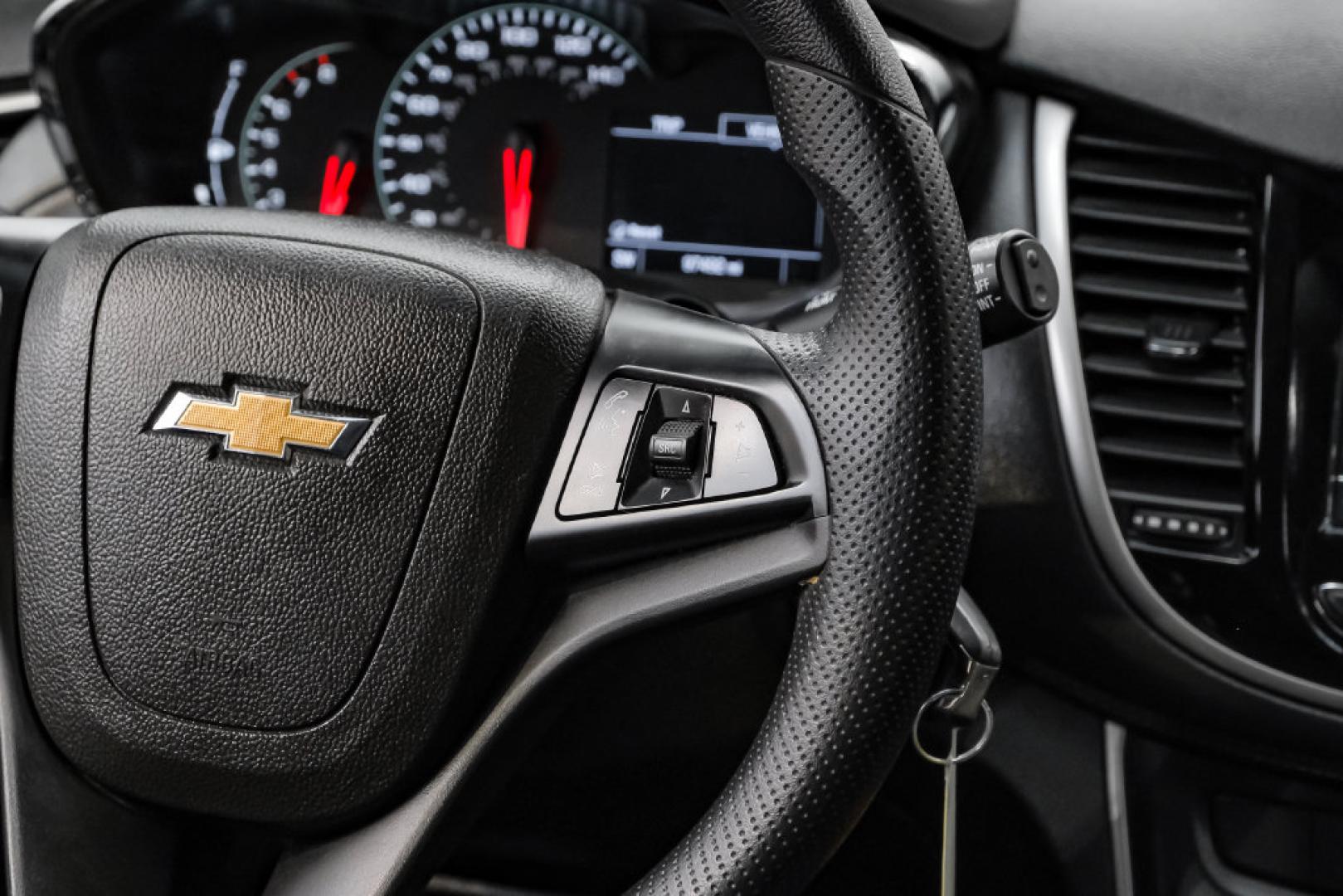 2019 Summit White /Black Chevrolet Trax LS (3GNCJKSB8KL) with an ECOTEC 1.4L I4 SMPI DOHC Turbocharged VVT engine, Automatic transmission, located at 15300 Midway Rd., Addison, TX, 75001, (972) 702-0011, 32.958321, -96.838074- Photo#23