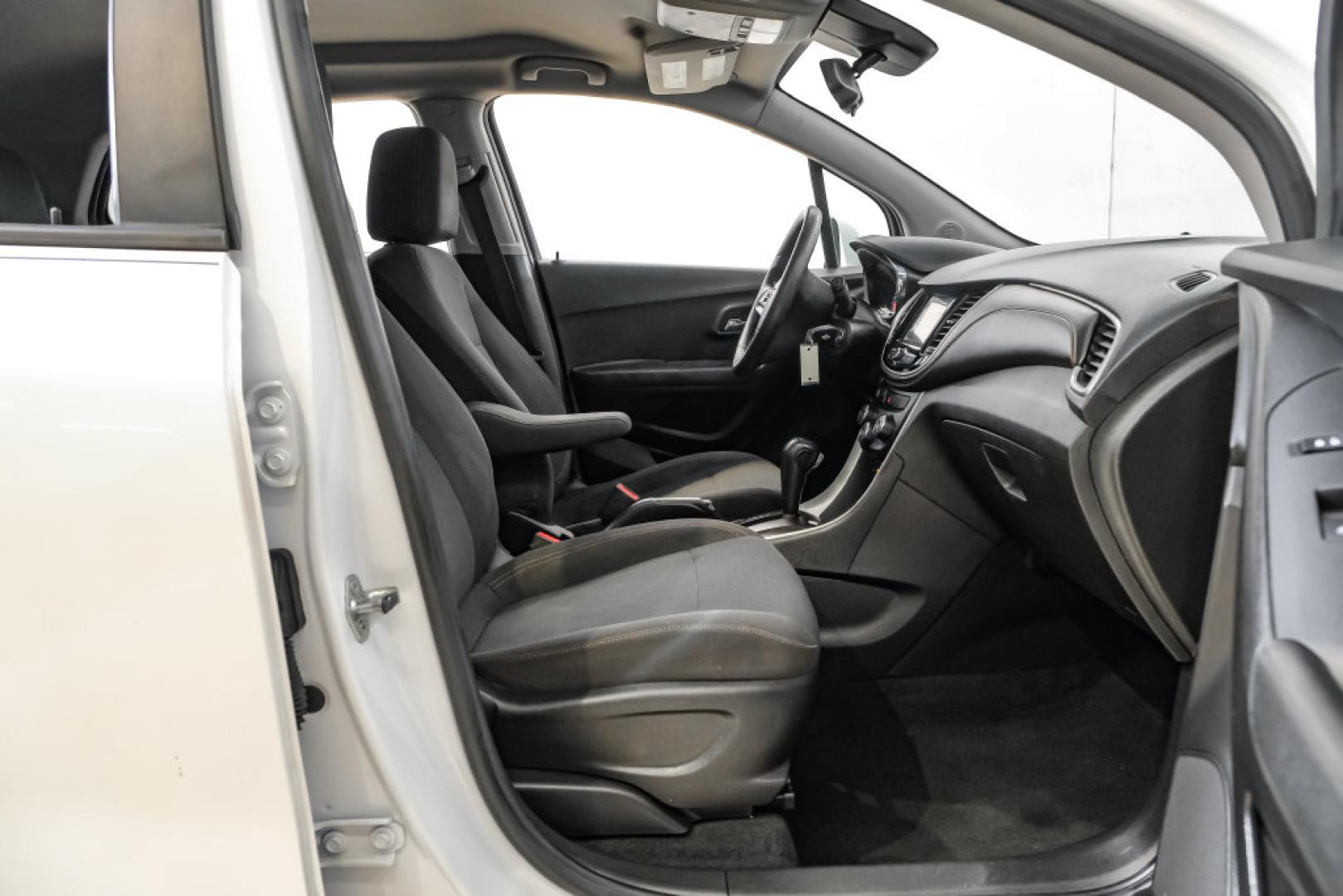2019 Summit White /Black Chevrolet Trax LS (3GNCJKSB8KL) with an ECOTEC 1.4L I4 SMPI DOHC Turbocharged VVT engine, Automatic transmission, located at 15300 Midway Rd., Addison, TX, 75001, (972) 702-0011, 32.958321, -96.838074- Photo#37