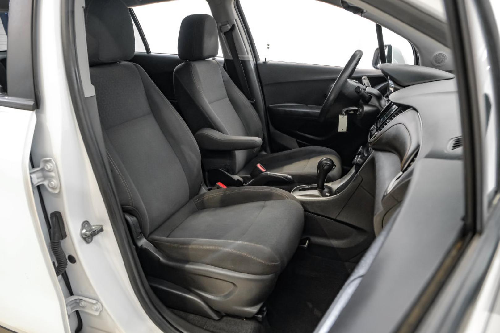 2019 Summit White /Black Chevrolet Trax LS (3GNCJKSB8KL) with an ECOTEC 1.4L I4 SMPI DOHC Turbocharged VVT engine, Automatic transmission, located at 15300 Midway Rd., Addison, TX, 75001, (972) 702-0011, 32.958321, -96.838074- Photo#38