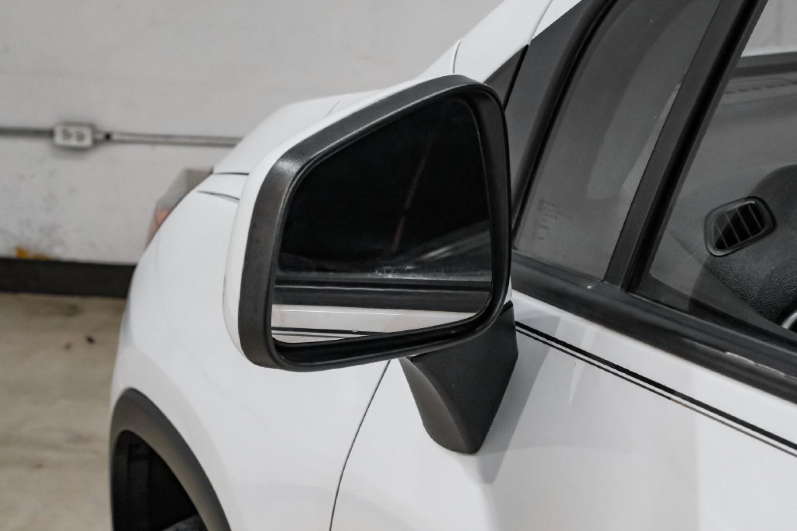 2019 Summit White /Black Chevrolet Trax LS (3GNCJKSB8KL) with an ECOTEC 1.4L I4 SMPI DOHC Turbocharged VVT engine, Automatic transmission, located at 15300 Midway Rd., Addison, TX, 75001, (972) 702-0011, 32.958321, -96.838074- Photo#43