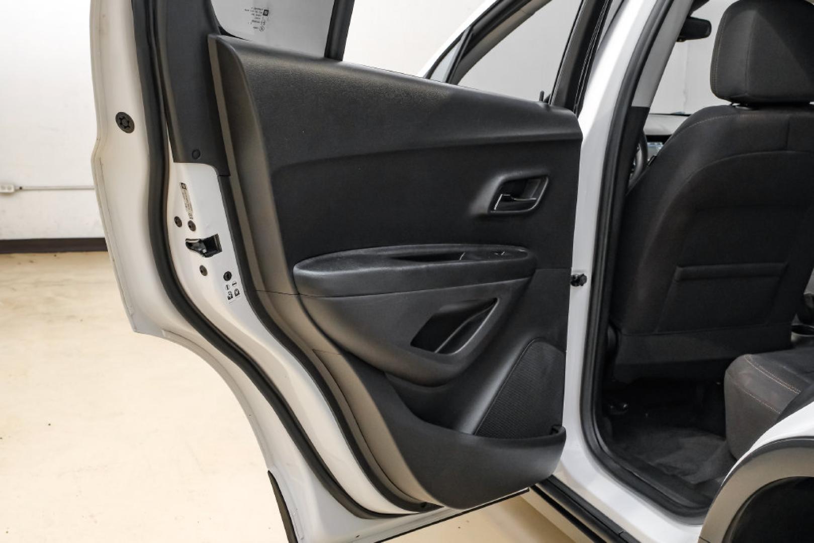 2019 Summit White /Black Chevrolet Trax LS (3GNCJKSB8KL) with an ECOTEC 1.4L I4 SMPI DOHC Turbocharged VVT engine, Automatic transmission, located at 15300 Midway Rd., Addison, TX, 75001, (972) 702-0011, 32.958321, -96.838074- Photo#48