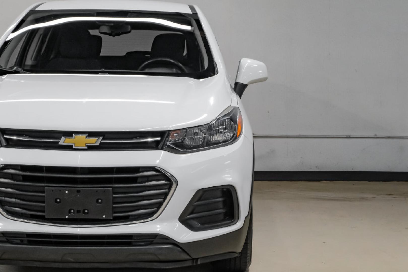 2019 Summit White /Black Chevrolet Trax LS (3GNCJKSB8KL) with an ECOTEC 1.4L I4 SMPI DOHC Turbocharged VVT engine, Automatic transmission, located at 15300 Midway Rd., Addison, TX, 75001, (972) 702-0011, 32.958321, -96.838074- Photo#50