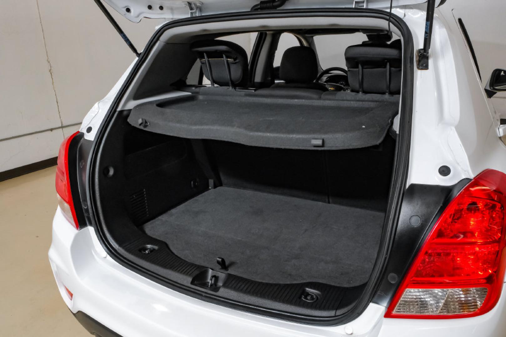 2019 Summit White /Black Chevrolet Trax LS (3GNCJKSB8KL) with an ECOTEC 1.4L I4 SMPI DOHC Turbocharged VVT engine, Automatic transmission, located at 15300 Midway Rd., Addison, TX, 75001, (972) 702-0011, 32.958321, -96.838074- Photo#58