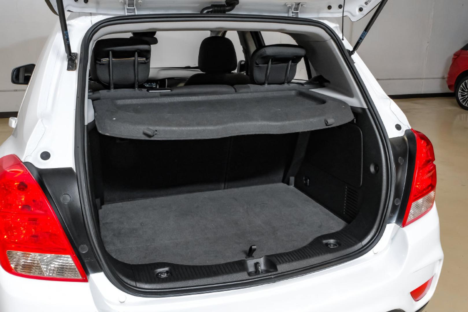 2019 Summit White /Black Chevrolet Trax LS (3GNCJKSB8KL) with an ECOTEC 1.4L I4 SMPI DOHC Turbocharged VVT engine, Automatic transmission, located at 15300 Midway Rd., Addison, TX, 75001, (972) 702-0011, 32.958321, -96.838074- Photo#59