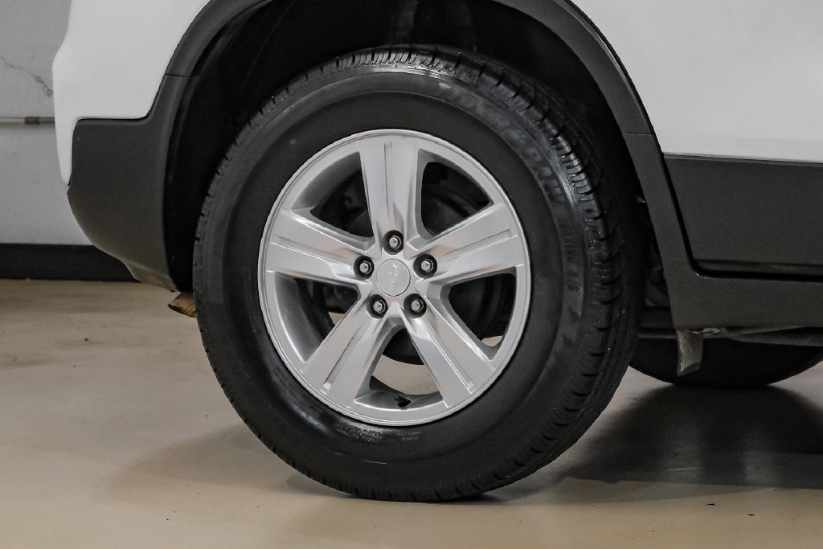 2019 Summit White /Black Chevrolet Trax LS (3GNCJKSB8KL) with an ECOTEC 1.4L I4 SMPI DOHC Turbocharged VVT engine, Automatic transmission, located at 15300 Midway Rd., Addison, TX, 75001, (972) 702-0011, 32.958321, -96.838074- Photo#60