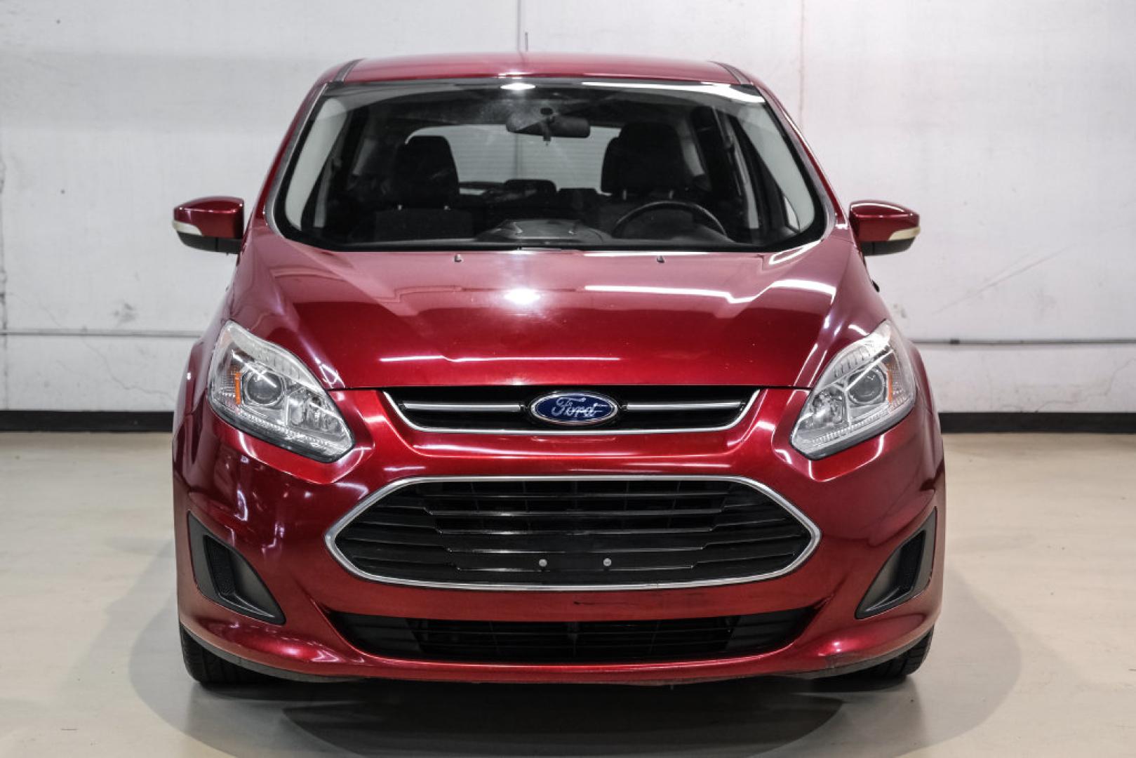 2017 Ruby Red Metallic /Black Ford C-Max Hybrid SE (1FADP5AU1HL) with an I4 Hybrid engine, CVT transmission, located at 15300 Midway Rd., Addison, TX, 75001, (972) 702-0011, 32.958321, -96.838074- Photo#4